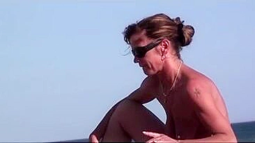 Scandalous! At The Nudists Beach, Voyeur Camera Films Your Wife Giving Blowjob