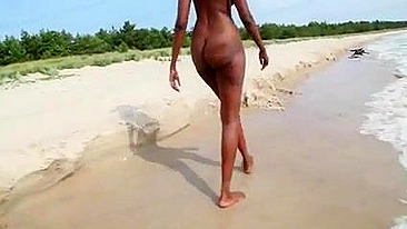 Slinky, Ebony Goddess Struts On The Sizzling Sand!