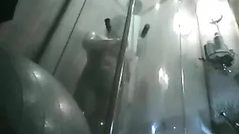 Sneakily Capture Her Exposed Body In The Steamy Shower