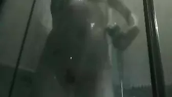 Sneakily Capture Her Exposed Body In The Steamy Shower