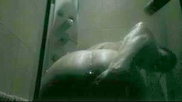 Sneakily Capture Her Exposed Body In The Steamy Shower