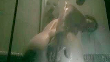 Sneakily Capture Her Exposed Body In The Steamy Shower