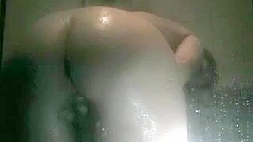 Sneakily Capture Her Exposed Body In The Steamy Shower