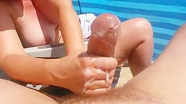 Wife Passionately Jerks Off Husband At The Beach