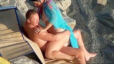 Voyeuristic, Sultry, And Mature Couple Caught In A Beach Tryst