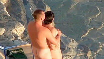 Voyeuristic, Sultry, And Mature Couple Caught In A Beach Tryst