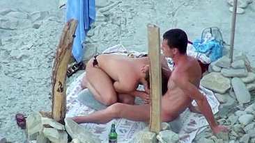 Naked Wife at the Beach Performs a Blowjob