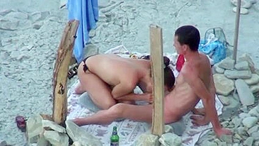 Naked Wife at the Beach Performs a Blowjob