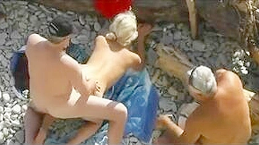 Sultry Nudist Couple's Lustful Romp On Sandy Beach