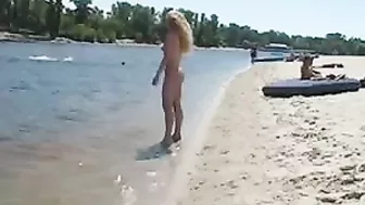 Beautiful, Busty, Tanning Naked Blonde Girl At Beach