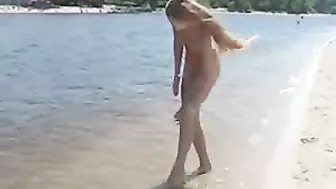 Beautiful, Busty, Tanning Naked Blonde Girl At Beach