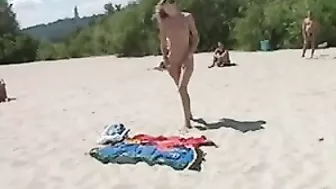 Beautiful, Busty, Tanning Naked Blonde Girl At Beach