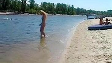 Beautiful, Busty, Tanning Naked Blonde Girl At Beach