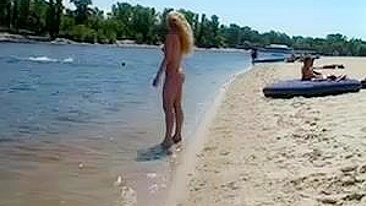 Beautiful, Busty, Tanning Naked Blonde Girl At Beach