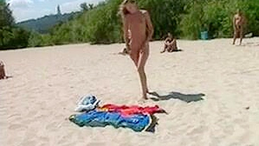 Beautiful, Busty, Tanning Naked Blonde Girl At Beach