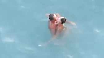 Passionate Couple Rendezvousing At The Sandy Shore