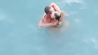 Passionate Couple Rendezvousing At The Sandy Shore