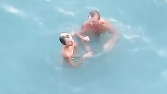 Passionate Couple Rendezvousing At The Sandy Shore