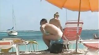 Topless Naked Woman With Incredible Big Tits At The Beach