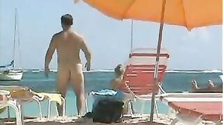 Topless Naked Woman With Incredible Big Tits At The Beach