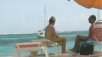Topless Naked Woman With Incredible Big Tits At The Beach