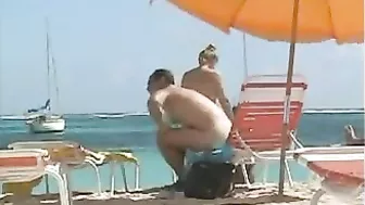 Topless Naked Woman With Incredible Big Tits At The Beach
