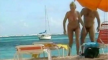 Topless Naked Woman With Incredible Big Tits At The Beach