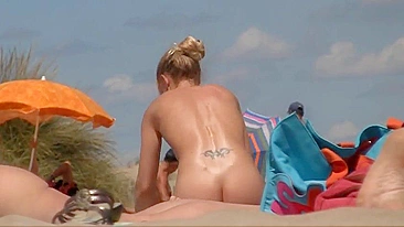 Scandalous! Sexy French Nudist Woman Sneakily Filmed On The Beach!