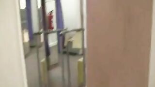 Exhibitionist Woman Gives Blowjob in Dressing Room at Mall