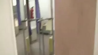 Exhibitionist Woman Gives Blowjob in Dressing Room at Mall