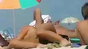 Sexy, Nude Women Filmed Sunbathing At The Beach