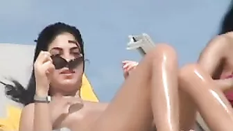 Sultry Beach Babe Films Topless Tittillation On Hidden Voyeur Camera