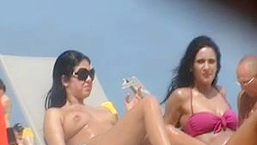 Sultry Beach Babe Films Topless Tittillation On Hidden Voyeur Camera