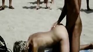 Scandalous Couple Publicly Copulates On Beach With Eager Onlookers