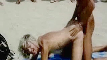 Scandalous Couple Publicly Copulates On Beach With Eager Onlookers