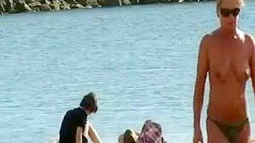 Topless Beach Video Mature Woman Caught on Camera