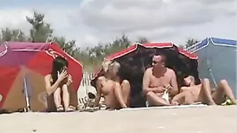Hot Brunette Woman with Big Tits Filmed Naked at the Beach