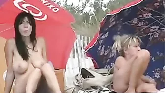Hot Brunette Woman with Big Tits Filmed Naked at the Beach