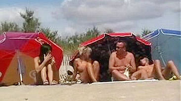 Hot Brunette Woman with Big Tits Filmed Naked at the Beach