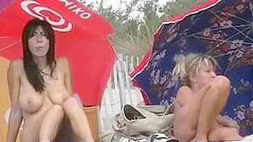 Hot Brunette Woman with Big Tits Filmed Naked at the Beach