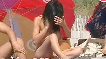 Hot Brunette Woman with Big Tits Filmed Naked at the Beach