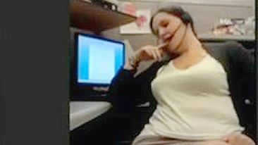 Sultry Woman Self-Entertains At Desk, Captures Intimate Moment On Cam