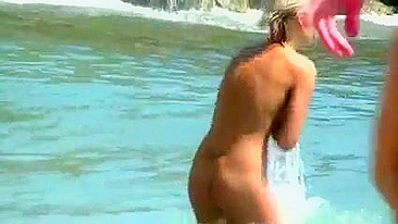 Huge Tits on the Beach of a Beautiful Girl Filmed Voyeur