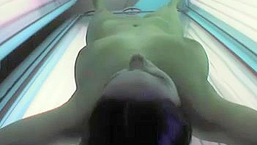 Clandestine Camera In Sultry Solarium Reveals Nude, Sexually Alluring Feline