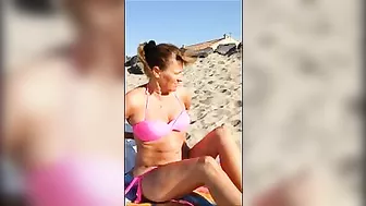 Mature Wife Takes Off Bra for Topless Sunbath at Beach