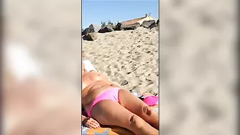 Mature Wife Takes Off Bra for Topless Sunbath at Beach