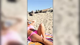 Mature Wife Takes Off Bra for Topless Sunbath at Beach