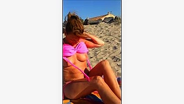 Mature Wife Takes Off Bra for Topless Sunbath at Beach