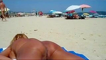 Scandalous! Sneaky Cam Captures Nude Beach Babes In Steamy Action