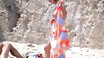 Sexy, Bountiful, And Tittilatingly Topless Beach Babe